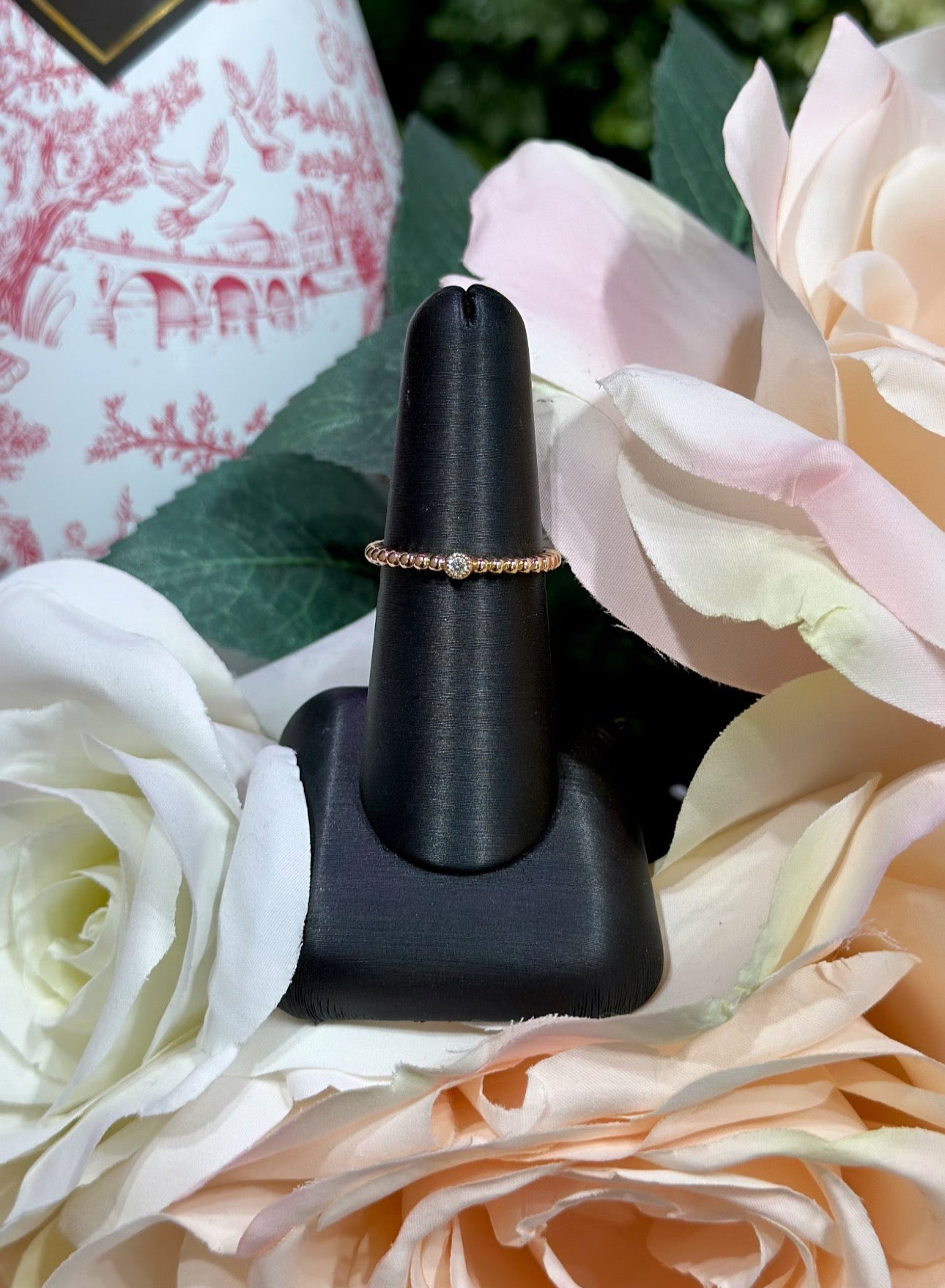 14k Rose Gold Fashion Ring with a Round Diamond center stone